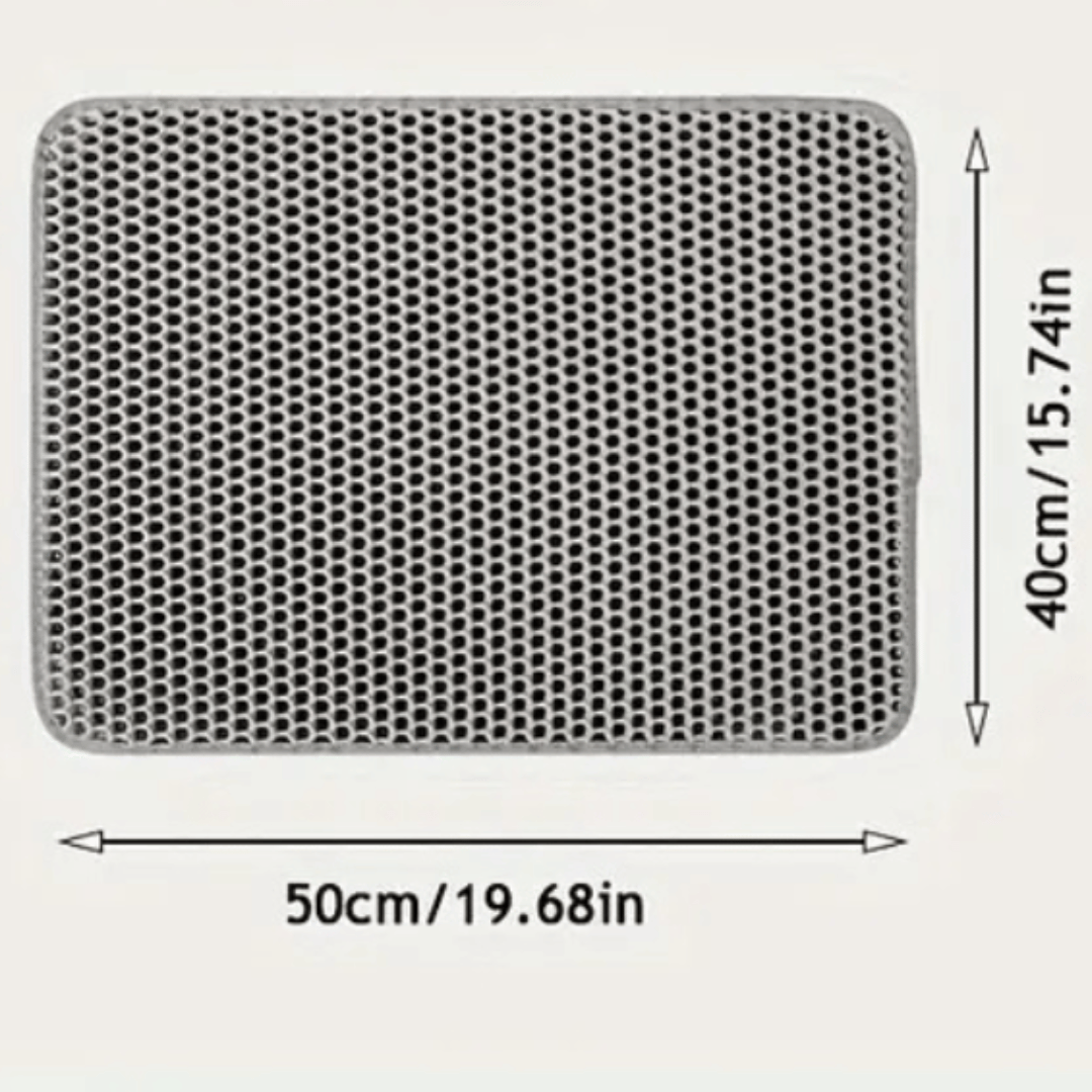 En grå dubbellagers kattmatts med måtten 50 cm x 40 cm. Mattan har en bikakeformad design som effektivt fångar upp kattsand.