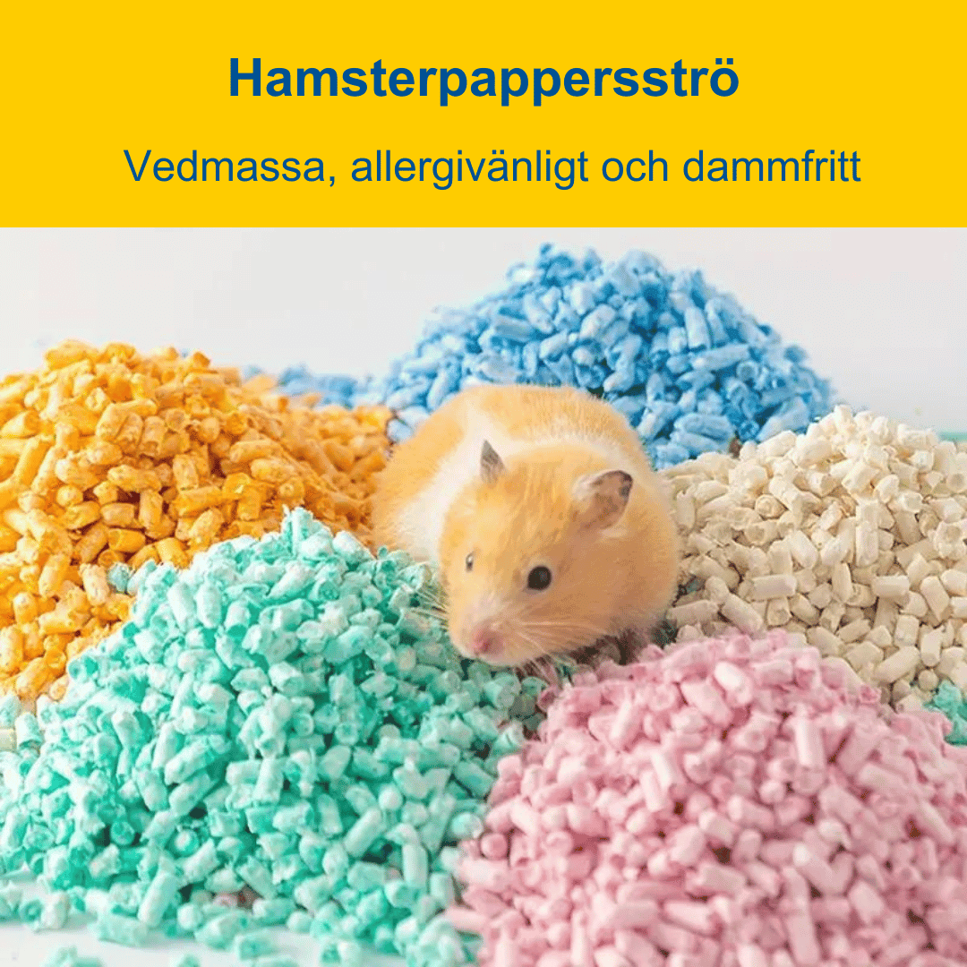 En hamster sitter omgiven av färgglatt hamsterpappersströ i blått, orange, rosa och vitt.  Texten 